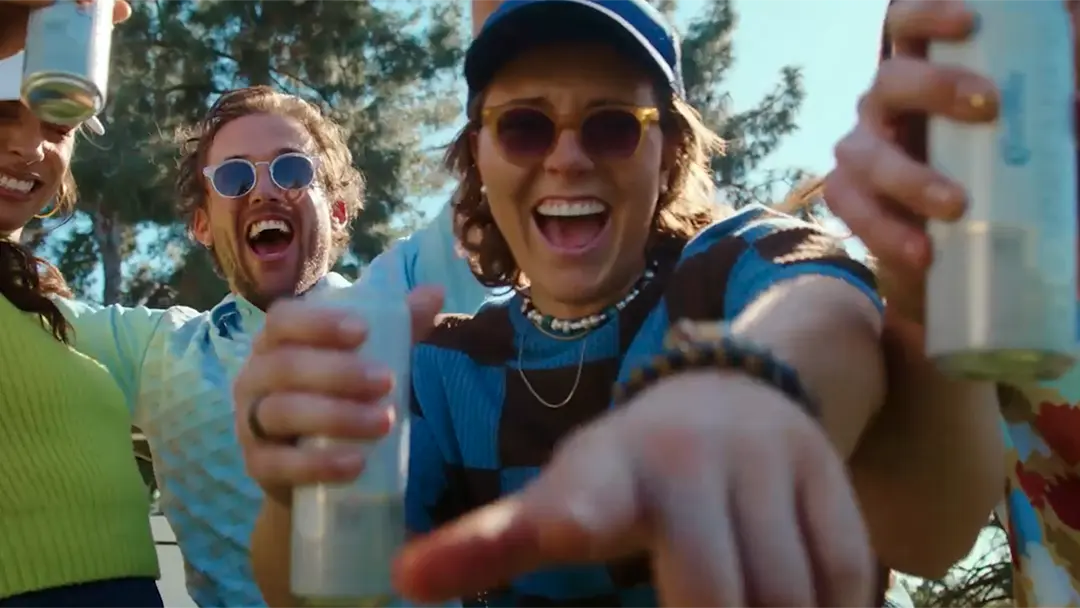 youthful partygoers drinking Corona Premier